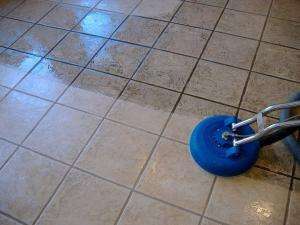 Close-up of dirty ceramic tile and grout before professional cleaning by Elite Carpet Tile & Grout Cleaning in Michigan — trusted family-owned company for deep tile restoration.