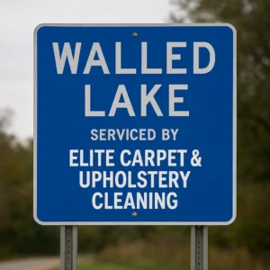Welcome sign for Walled Lake, Michigan with 'Serviced by Elite Carpet & Upholstery Cleaning' — affordable carpet steam cleaning near me in Walled Lake MI