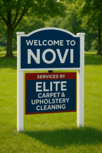 Welcome sign for Novi, Michigan with 'Serviced by Elite Carpet & Upholstery Cleaning' text overlay — highlighting expert local steam carpet cleaning services.